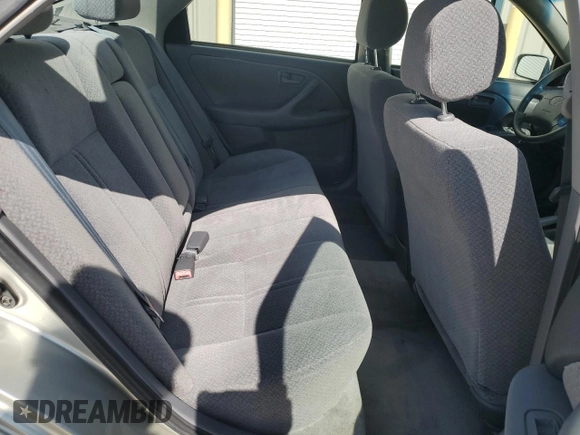 2000 Toyota Camry CE with VIN JT2BG22K9Y0520572, listed as a Copart auction lot 51062815 with 130,878 mi miles and Salvage Title. Bid and sale history available at DreamBid. Image 10.