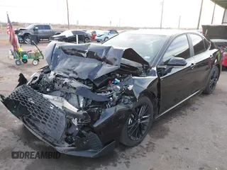 2025 Toyota Camry LE z VIN 4T1DAACK5SU523507, wystawiony jako IAAI lot #41389041 z przebiegiem 5 027 mil mil oraz . Historia ofert i sprzedaży dostępna na DreamBid. Obrazek 2.