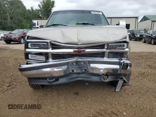 1999 Chevrolet Suburban with VIN 1GNGK26J0XJ439859, listed as a Copart auction lot 69076004 with 277,201 mi miles and Salvage Title. Bid and sale history available at carsss.com. Image 5.