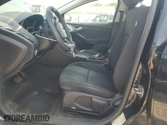 2016 Ford Focus SE with VIN 1FADP3F22GL233402, listed as a Copart auction lot 60854175 with 77,002 mi miles and Salvage title. Bid and sale history available at DreamBid. Image 7.