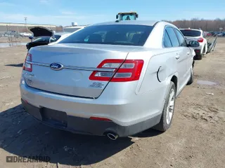 2014 Ford Taurus SEL with VIN 1FAHP2E86EG108619, listed as a IAAI auction lot 41839370 with 91,620 mi miles. Bid and sale history available at carsss.com. Image 4.