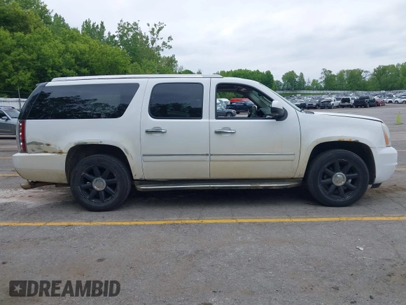 2011 GMC Yukon XL Denali z VIN 1GKS2MEF2BR190877, wystawiony jako IAAI lot #42364202 z przebiegiem 160 063 mil mil oraz . Historia ofert i sprzedaży dostępna na DreamBid. Obrazek 13.