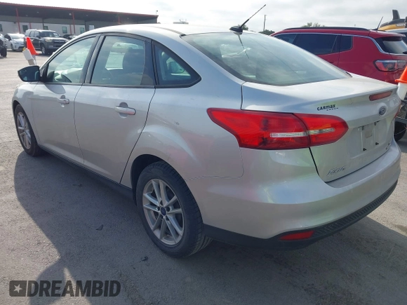 2015 Ford Focus SE with VIN 1FADP3F2XFL340583, listed as a IAAI auction lot 42099224 with 111,970 mi miles. Bid and sale history available at carsss.com. Image 3.