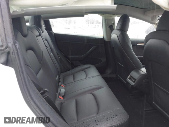 2023 Tesla Model 3 with VIN 5YJ3E1EA6PF432397, listed as a IAAI auction lot 41760895 with 15,692 mi miles and . Bid and sale history available at DreamBid. Image 8.
