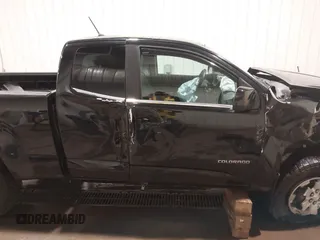 2019 Chevrolet Colorado 4WD Work Truck z VIN 1GCHTBENXK1192664, wystawiony jako IAAI lot #41883583 z przebiegiem 132 753 mil mil oraz . Historia ofert i sprzedaży dostępna na DreamBid. Obrazek 14.