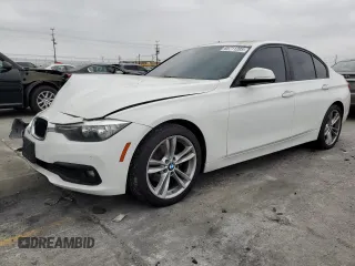 2017 BMW 3 Series 320i with VIN WBA8E1G33HNU18090, listed as a Copart auction lot 65711205 with 137,801 mi miles and Salvage title. Bid and sale history available at DreamBid. Image 1.