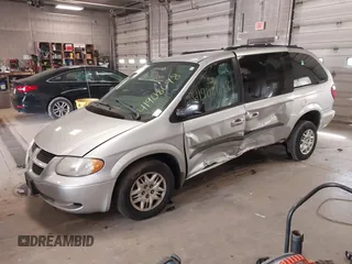 2003 Dodge Grand Caravan with VIN 2D4GP44353R166193, listed as a IAAI auction lot 41908698 with 181,371 mi miles and . Bid and sale history available at DreamBid. Image 2.