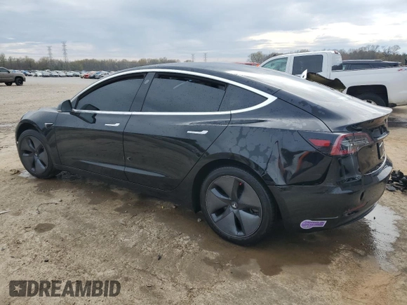 2019 Tesla Model 3 Mid Range z VIN 5YJ3E1EA8KF297299, wystawiony jako Copart lot #47935394 z przebiegiem 117 644 mil mil oraz Szkoda całkowita • Salvage title. Historia ofert i sprzedaży dostępna na DreamBid. Obrazek 2.