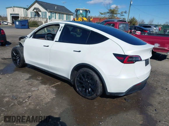 2021 Tesla Model Y Long Range with VIN 5YJYGAEE6MF196610, listed as a IAAI auction lot 41516909 with 30,431 mi miles. Bid and sale history available at carsss.com. Image 3.