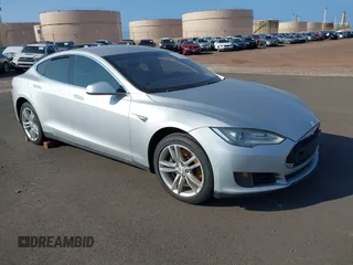 2013 Tesla Model S with VIN 5YJSA1AC3DFP10537, listed as a IAAI auction lot 40707549 with 103,111 mi miles and . Bid and sale history available at DreamBid. Image 1.