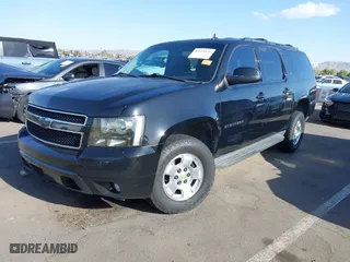 2012 Chevrolet Suburban LT with VIN 1GNSCJE00CR226285, listed as a IAAI auction lot 42059936 with 318,948 mi miles. Bid and sale history available at carsss.com. Image 2.