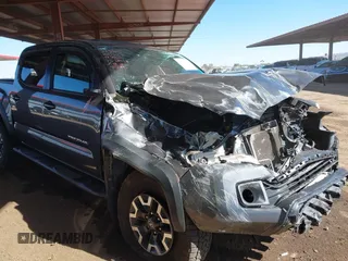 2017 Toyota Tacoma SR5 with VIN 3TMCZ5AN7HM104214, listed as a IAAI auction lot 41619808 with 48,236 mi miles and . Bid and sale history available at carsss.com. Image 1.
