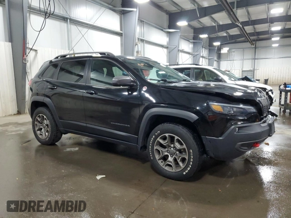 2020 Jeep Cherokee Trailhawk with VIN 1C4PJMBX2LD638678, listed as a Copart auction lot 52197785 with 103,724 mi miles and Salvage title. Bid and sale history available at DreamBid. Image 4.