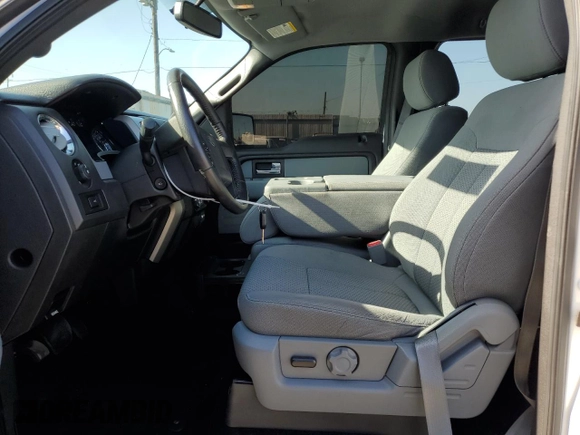 2014 Ford F-150 XL with VIN 1FTFW1CT1EKE22892, listed as a Copart auction lot 61635265 with 14,203 mi miles and Salvage title. Bid and sale history available at DreamBid. Image 7.