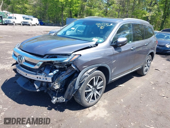 2021 Honda Pilot Touring 8-Passenger z VIN 5FNYF6H9XMB059037, wystawiony jako IAAI lot #42202410 z przebiegiem 49 267 mil mil oraz . Historia ofert i sprzedaży dostępna na DreamBid. Obrazek 18.
