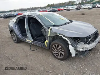 2018 Honda Civic Sedan EX with VIN 19XFC2F79JE007989, listed as a IAAI auction lot 41860829 with 72,223 mi miles. Bid and sale history available at carsss.com. Image 1.