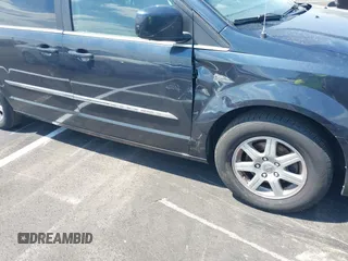 2013 Chrysler Town & Country Touring with VIN 2C4RC1BG8DR594671, listed as a IAAI auction lot 42039026 with 208,909 mi miles. Bid and sale history available at carsss.com. Image 6.