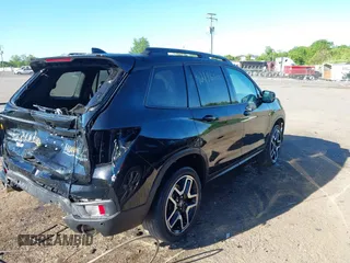 2022 Honda Passport Elite z VIN 5FNYF8H01NB003681, wystawiony jako IAAI lot #42186806 z przebiegiem 50 517 mil mil oraz . Historia ofert i sprzedaży dostępna na DreamBid. Obrazek 4.