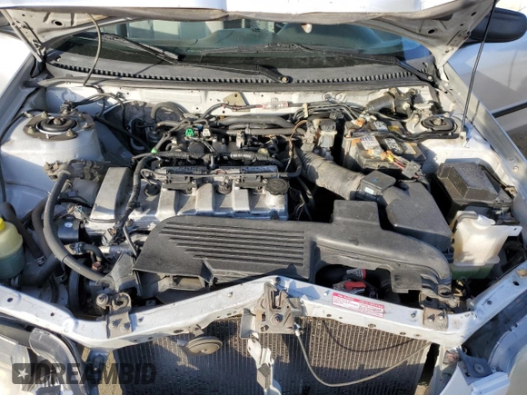 2002 Mazda Protege DX with VIN JM1BJ225120605237, listed as a Copart auction lot 49331225 with 184,556 mi miles and Salvage Title. Bid and sale history available at DreamBid. Image 12.