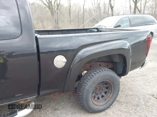 2005 GMC Canyon SLE Z85 with VIN 1GTDT196958206061, listed as a IAAI auction lot 42121015 with 158,440 mi miles. Bid and sale history available at carsss.com. Image 6.