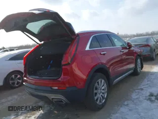 2021 Cadillac XT4 FWD Premium Luxury with VIN 1GYFZCR44MF019607, listed as a IAAI auction lot 41363064 with 24,364 mi miles. Bid and sale history available at carsss.com. Image 4.