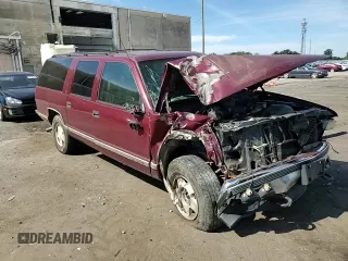 1998 GMC Suburban z VIN 3GKFK16R1WG503206, wystawiony jako Copart lot #69802344 z przebiegiem 231 148 mil mil oraz Szkody całkowita. Historia ofert i sprzedaży dostępna na DreamBid. Obrazek 11.