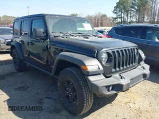 2020 Jeep Wrangler Unlimited Black and Tan with VIN 1C4HJXDGXLW219078, listed as a IAAI auction lot 41783437 with 59,137 mi miles and . Bid and sale history available at DreamBid. Image 1.