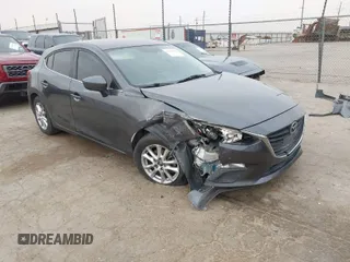 2014 Mazda Mazda3 i Touring with VIN JM1BM1L71E1111721, listed as a IAAI auction lot 41695478 with 132,084 mi miles. Bid and sale history available at carsss.com. Image 1.
