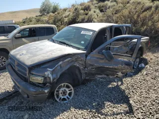 2002 Dodge Dakota z VIN 1B7HG38ZX2S711196, wystawiony jako Copart lot #62605094 z przebiegiem Nie podano mil oraz Szkoda całkowita • Salvage title. Historia ofert i sprzedaży dostępna na DreamBid. Obrazek 1.