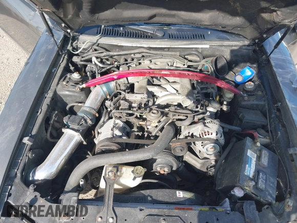 2004 Ford Mustang Standard z VIN 1FAFP40684F194867, wystawiony jako IAAI lot #39963442 z przebiegiem Nie podano mil oraz . Historia ofert i sprzedaży dostępna na DreamBid. Obrazek 10.