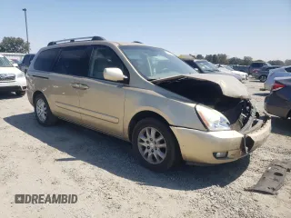 2006 Kia Sedona LX with VIN KNDMB233666035774, listed as a Copart auction lot 65491474 with 106,909 mi miles and Salvage Title. Bid and sale history available at carsss.com. Image 4.