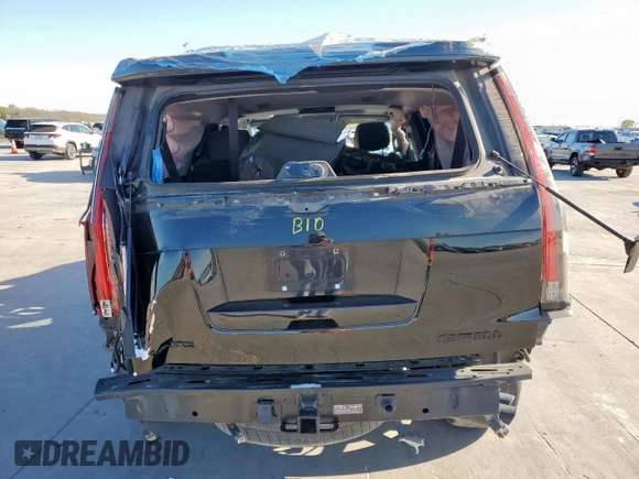 2015 Cadillac Escalade Premium z VIN 1GYS3NKJ3FR505290, wystawiony jako Copart lot #50048805 z przebiegiem Nie podano mil oraz Szkody całkowita. Historia ofert i sprzedaży dostępna na DreamBid. Obrazek 6.