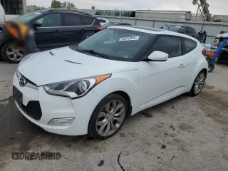 2013 Hyundai Veloster w/Black Int z VIN KMHTC6AD1DU124507, wystawiony jako Copart lot #54540435 z przebiegiem 136 667 mil mil oraz Szkoda całkowita • Salvage title. Historia ofert i sprzedaży dostępna na DreamBid. Obrazek 1.