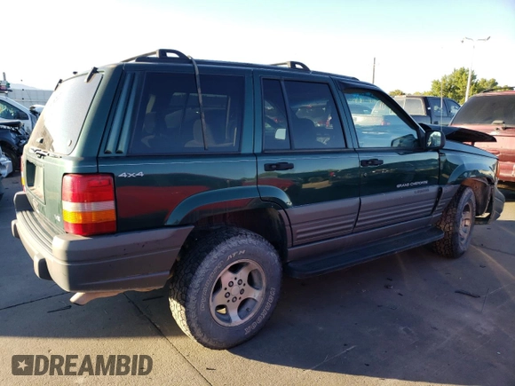 1997 Jeep Grand Cherokee Laredo with VIN 1J4GZ58Y6VC647434, listed as a Copart auction lot 73496824 with 124,946 mi miles and Salvage Title. Bid and sale history available at carsss.com. Image 3.