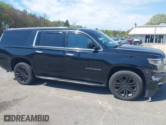 2015 Chevrolet Suburban LT with VIN 1GNSKJKC5FR275357, listed as a IAAI auction lot 42229934 with 359,009 mi miles and . Bid and sale history available at DreamBid. Image 13.