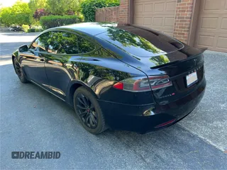 2017 Tesla Model S 60 with VIN 5YJSA1E15HF219286, listed as a Copart auction lot 57360515 with 44,520 mi miles and Salvage title. Bid and sale history available at DreamBid. Image 3.