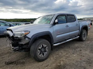 2020 Toyota Tacoma SR5 z VIN 3TMCZ5AN9LM332904, wystawiony jako Copart lot #55696325 z przebiegiem Nie podano mil oraz Szkoda całkowita • Salvage title. Historia ofert i sprzedaży dostępna na DreamBid. Obrazek 1.