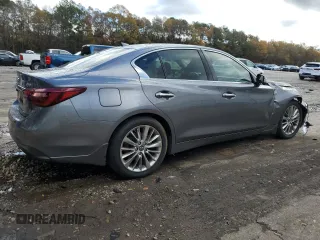 2019 Infiniti Q50 Sport with VIN JN1EV7AP6KM515983, listed as a Copart auction lot 84332744 with 59,812 mi miles and Salvage title. Bid and sale history available at DreamBid. Image 3.