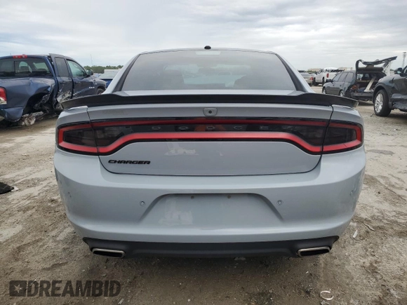 2020 Dodge Charger SXT with VIN 2C3CDXBG6LH192727, listed as a Copart auction lot 46730295 with 58,664 mi miles and Salvage Title. Bid and sale history available at DreamBid. Image 6.