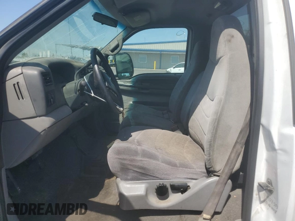 2000 Ford F-250 XL with VIN 1FTNF21F0YEC85459, listed as a Copart auction lot 63040505 with 328,049 mi miles and Salvage title. Bid and sale history available at DreamBid. Image 7.