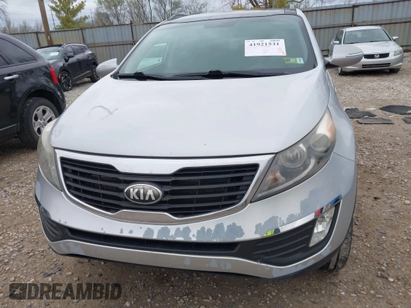 2013 Kia Sportage EX with VIN KNDPCCA22D7484936, listed as a IAAI auction lot 41921531 with 128,001 mi miles and . Bid and sale history available at DreamBid. Image 6.