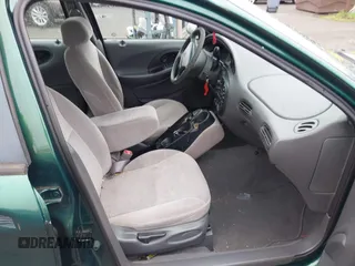 1999 Ford Taurus z VIN 1FAFP52S9XG309250, wystawiony jako IAAI lot #41797222 z przebiegiem 102 676 mil mil oraz . Historia ofert i sprzedaży dostępna na DreamBid. Obrazek 5.