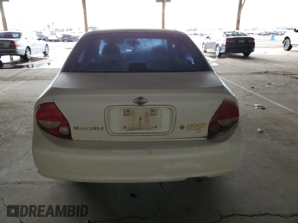 2001 Nissan Maxima GXE with VIN JN1CA31D41T809212, listed as a Copart auction lot 57845405 with 244,502 mi miles and Salvage title. Bid and sale history available at DreamBid. Image 6.