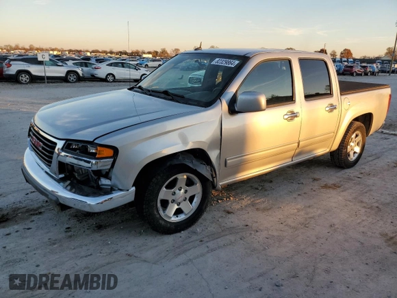 2011 GMC Canyon SLE1 with VIN 1GTD5MF99B8133327, listed as a Copart auction lot 82329864 with 213,115 mi miles and Salvage Title. Bid and sale history available at carsss.com. Image 1.