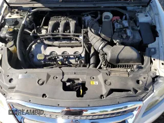 2011 Ford Taurus SEL z VIN 1FAHP2EW2BG188513, wystawiony jako Copart lot #58017755 z przebiegiem 211 530 mil mil oraz Szkoda całkowita • Salvage title. Historia ofert i sprzedaży dostępna na DreamBid. Obrazek 11.