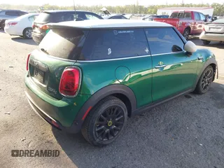 2022 MINI Hardtop Cooper SE with VIN WMW13DJ04N2S26388, listed as a IAAI auction lot 42123462 with 23,129 mi miles and . Bid and sale history available at DreamBid. Image 4.