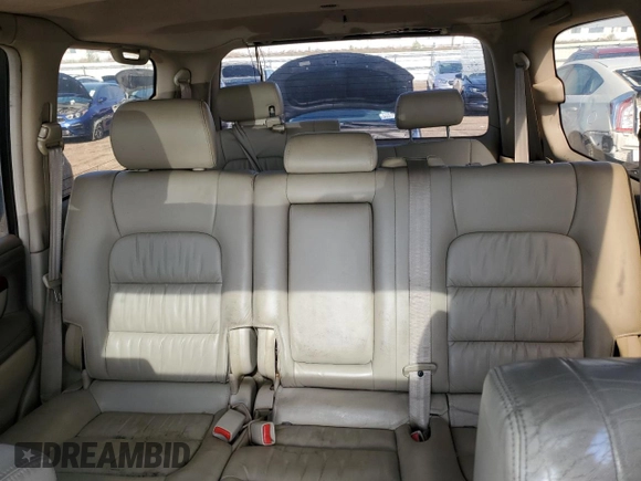 2002 Lexus LX 470 z VIN JTJHT00W923521442, wystawiony jako Copart lot #55936255 z przebiegiem 184 103 mil mil oraz Tytuł czysty. Historia ofert i sprzedaży dostępna na DreamBid. Obrazek 10.