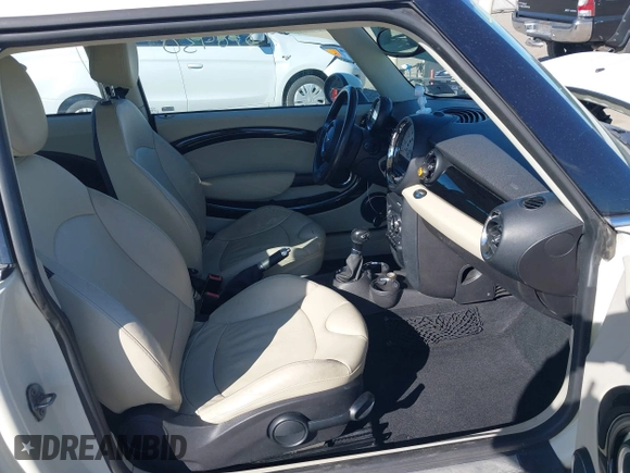 2012 MINI Hardtop with VIN WMWSU3C59CT255588, listed as a IAAI auction lot 41878430 with 103,033 mi miles and . Bid and sale history available at DreamBid. Image 5.