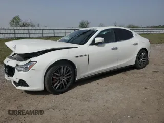 2017 Maserati Ghibli with VIN ZAM57XSA6H1233933, listed as a Copart auction lot 49089525 with 76,965 mi miles and Salvage Title. Bid and sale history available at carsss.com. Image 1.