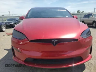 2023 Tesla Model X Plaid with VIN 7SAXCBE66PF427020, listed as a Copart auction lot 53890405 with 30,575 mi miles and Salvage Title. Bid and sale history available at DreamBid. Image 5.